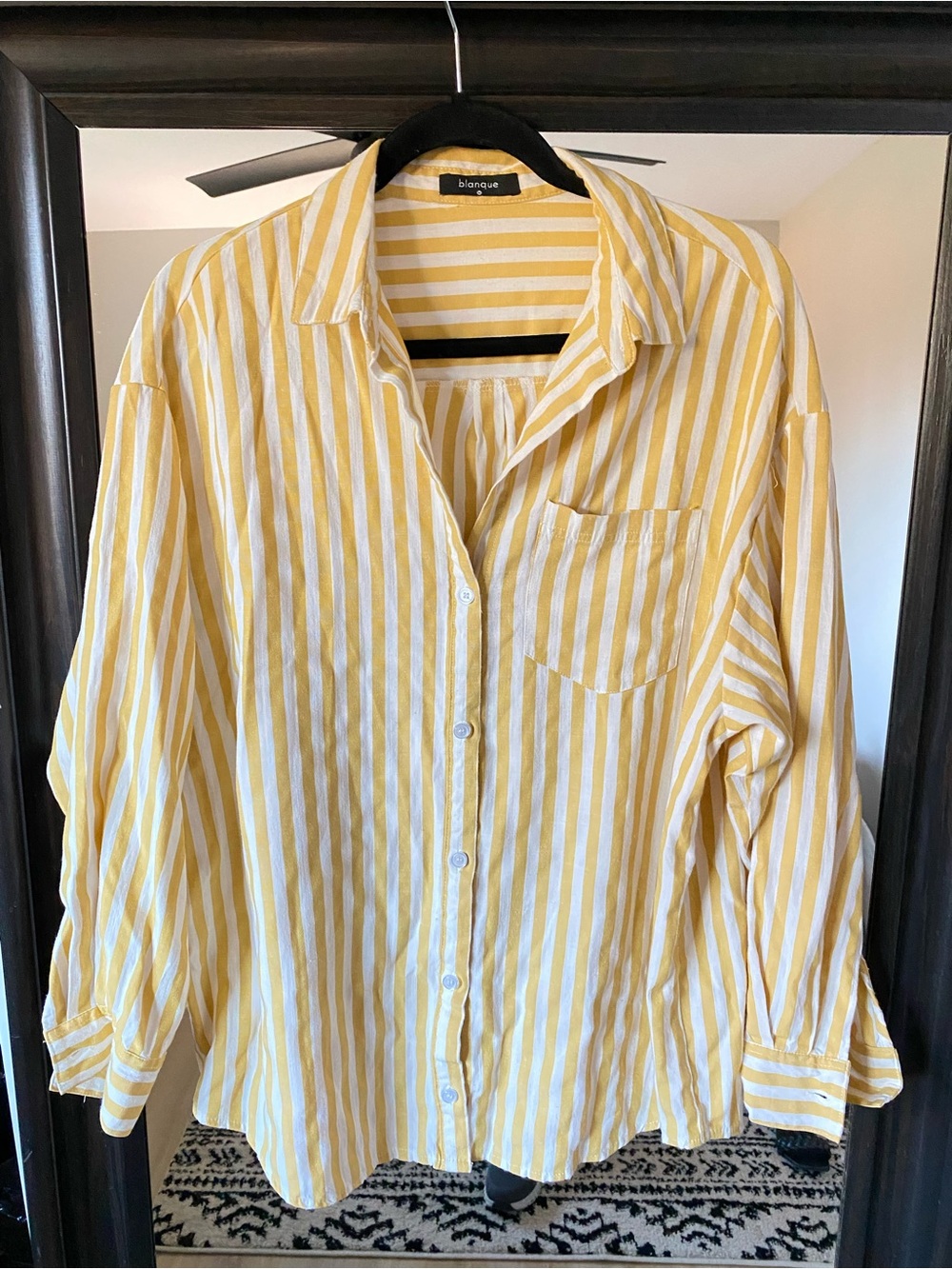 Women’s yellow-and-white vertically striped oversized button-down shirt